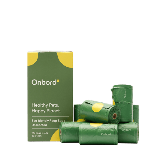 Eco-friendly waste bags by Onbord in green packaging with rolls, promoting healthy pets and a happy planet.